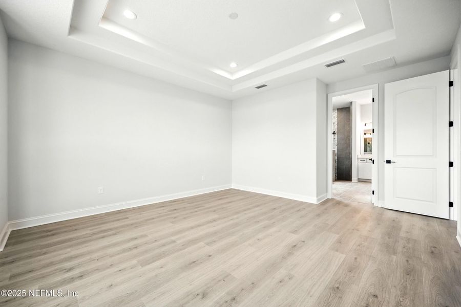 Spacious, unfurnished interior of a new home in Silver Landing At Silverleaf, St. Augustine (Image 22).