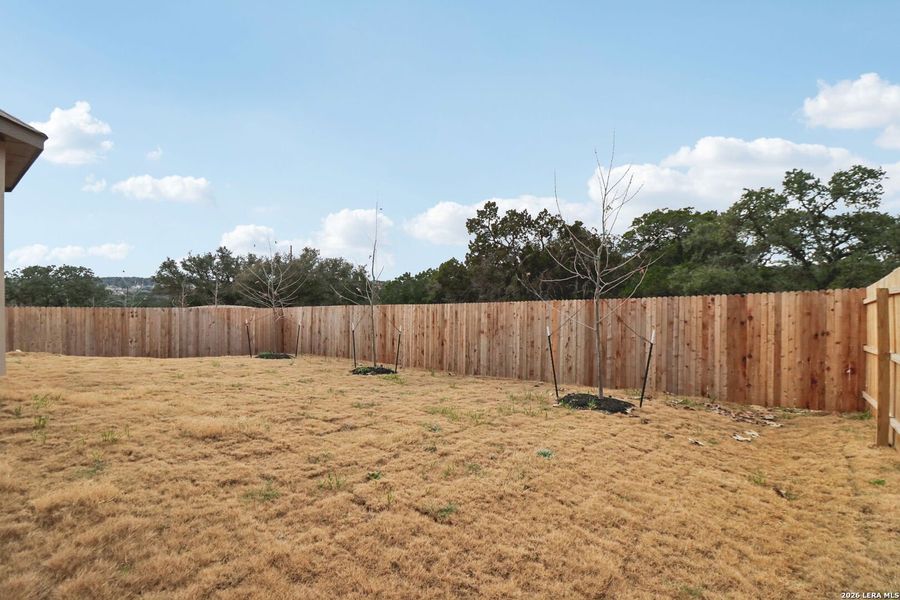 Exterior details and patio area of a home in Scenic Crest - Premier Series, Boerne (Image 27).