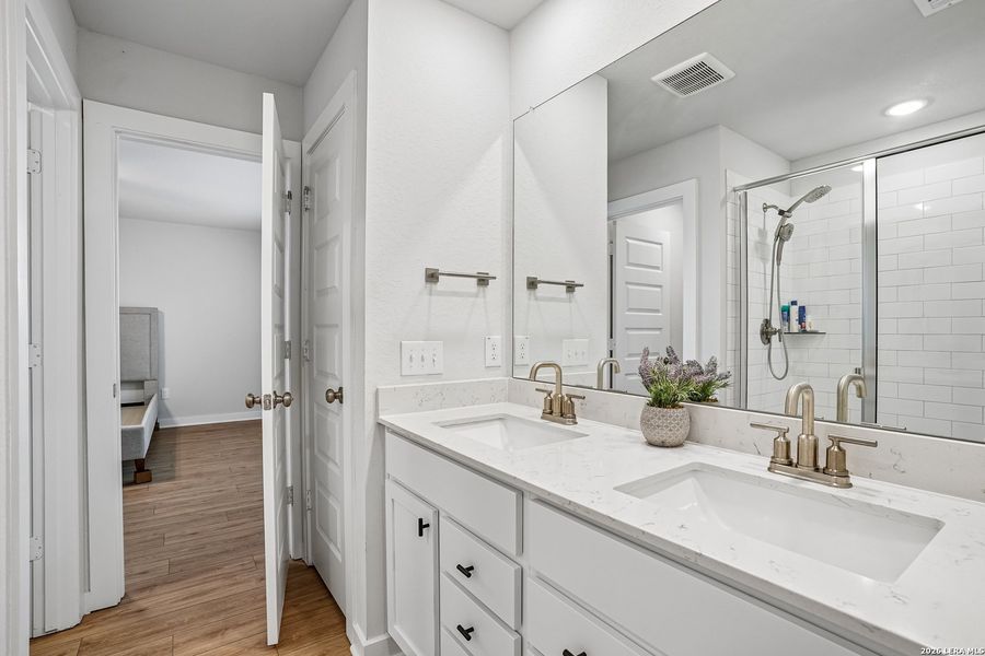 Furnished interior view inside a new home in University Village, San Antonio (Image 15).