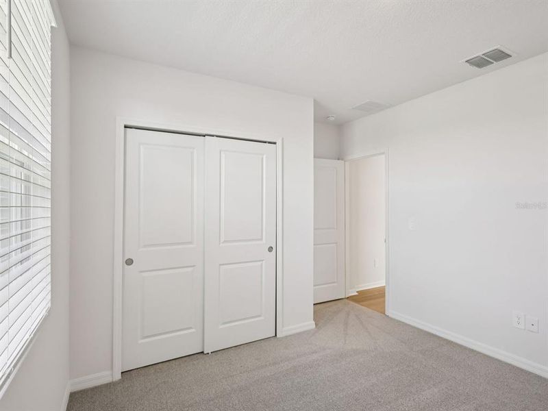 Spacious, unfurnished interior of a new home in The Grove at Stuart Crossing - Classic Series, Bartow (Image 22). Spacious, unfurnished interior of a new home in The Grove at Stuart Crossing - Classic Series, Bartow (Image 22).