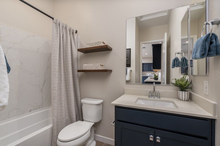 Representative furnished interior of a home built from the Madera 5G by Risewell Homes in Wildera, San Tan Valley (Image 15).