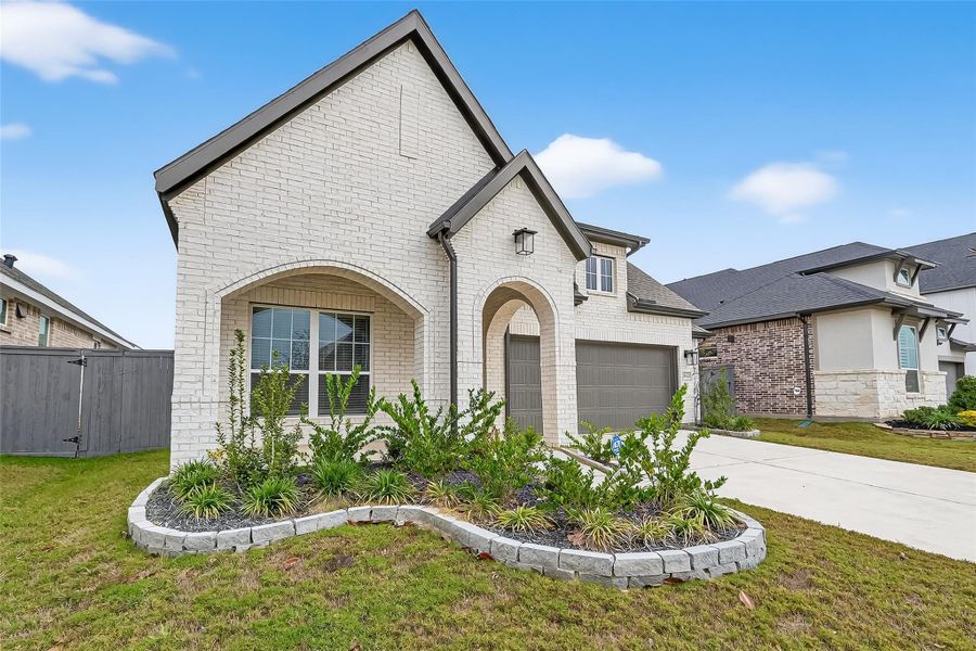 Front exterior of a new home in Jubilee, Hockley, TX, highlighting curb appeal (Image 28).