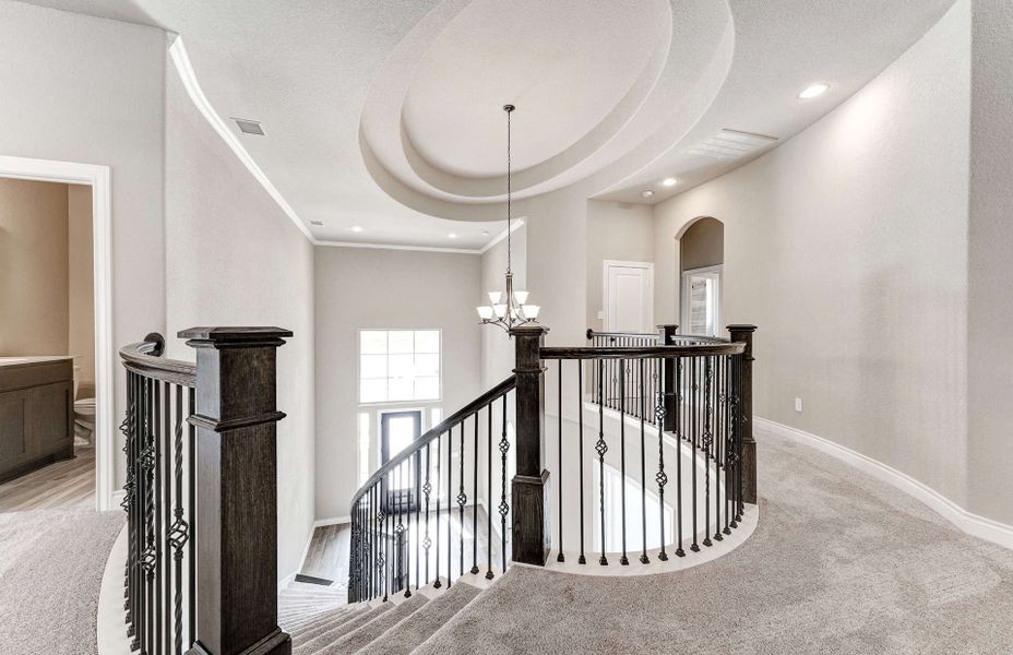 Furnished interior view inside a new home in Bridgeland 60′, Cypress (Image 11).