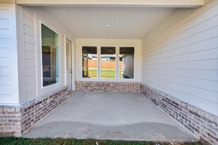 Exterior details and patio area of a home in Liberty Pointe, Gainesville (Image 27).