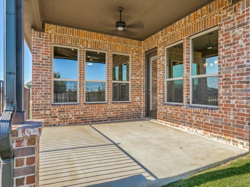 Exterior details and patio area of a home in Ladera Tavolo Park, Fort Worth (Image 24).