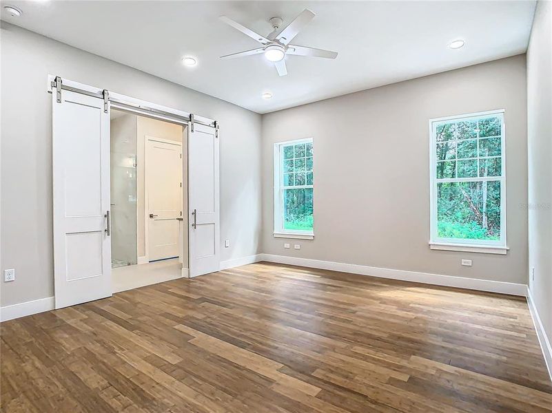 Main bedroom with barn style doors