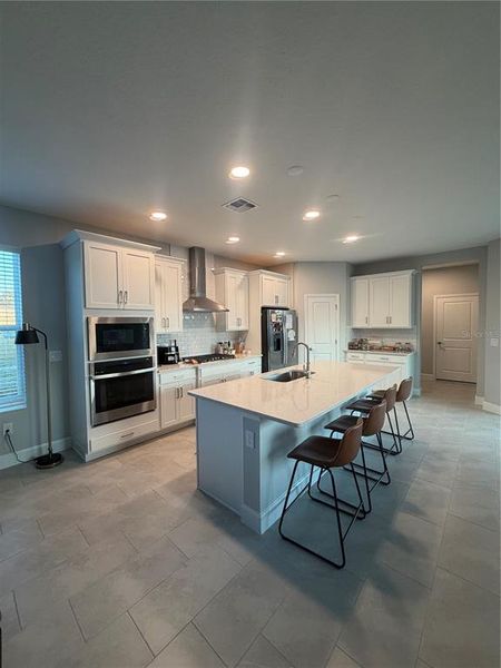 Furnished interior view inside a new home in Center Lake on the Park, St. Cloud (Image 7).