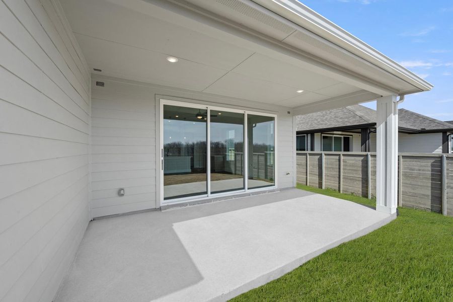 Exterior details and patio area of a home in Treeline, Justin (Image 19).
