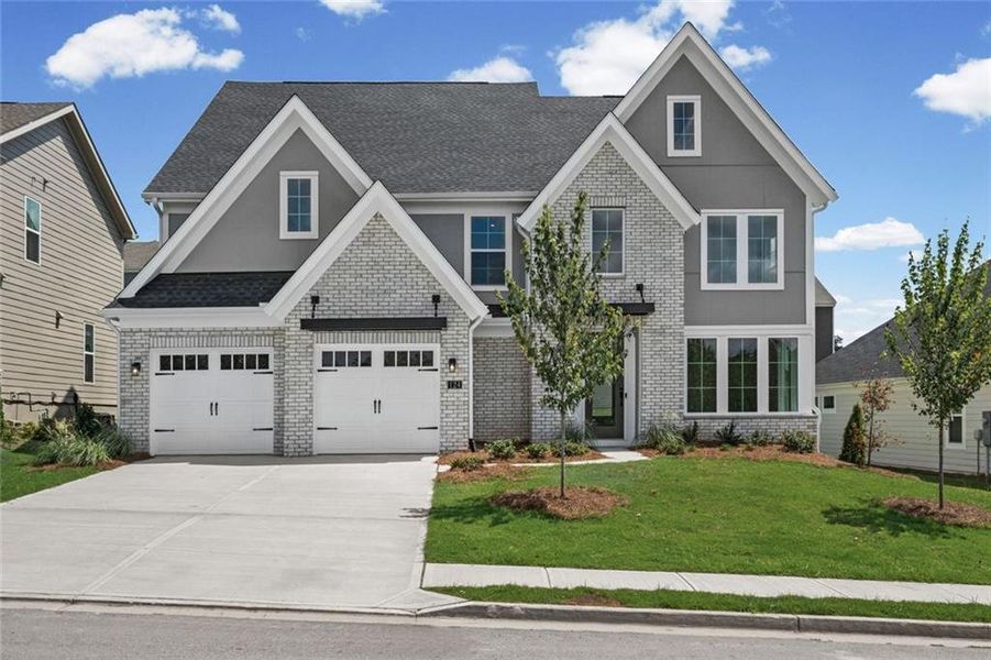 Front exterior of a new home in Twin Lakes, Hoschton, GA, highlighting curb appeal (Image 23).