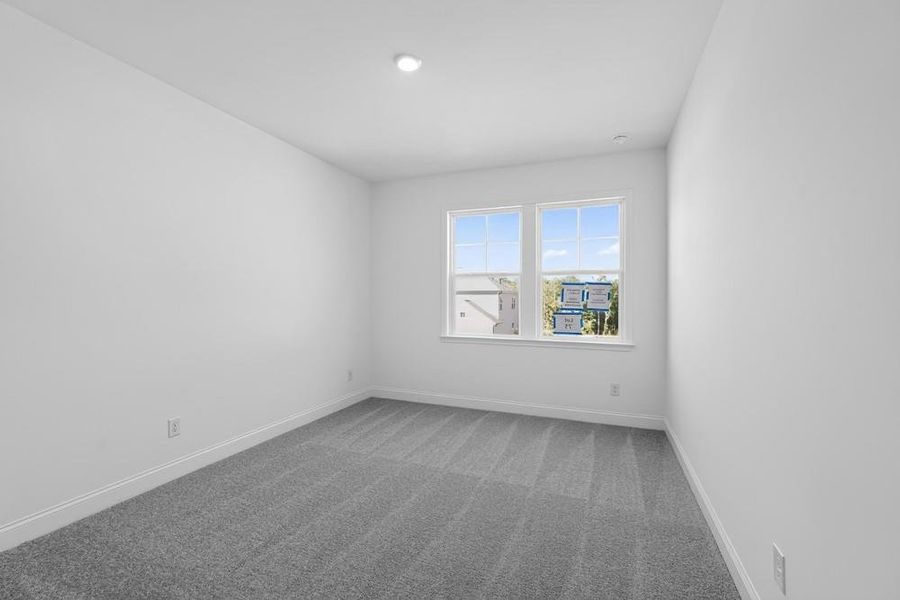 Spacious, unfurnished interior of a new home in Bailey Fence, Dacula (Image 34).