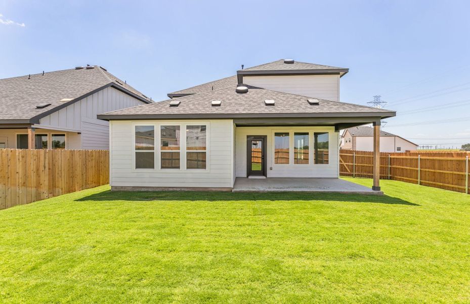 Exterior details and patio area of a home in Kuempel Farms, Pflugerville (Image 29).
