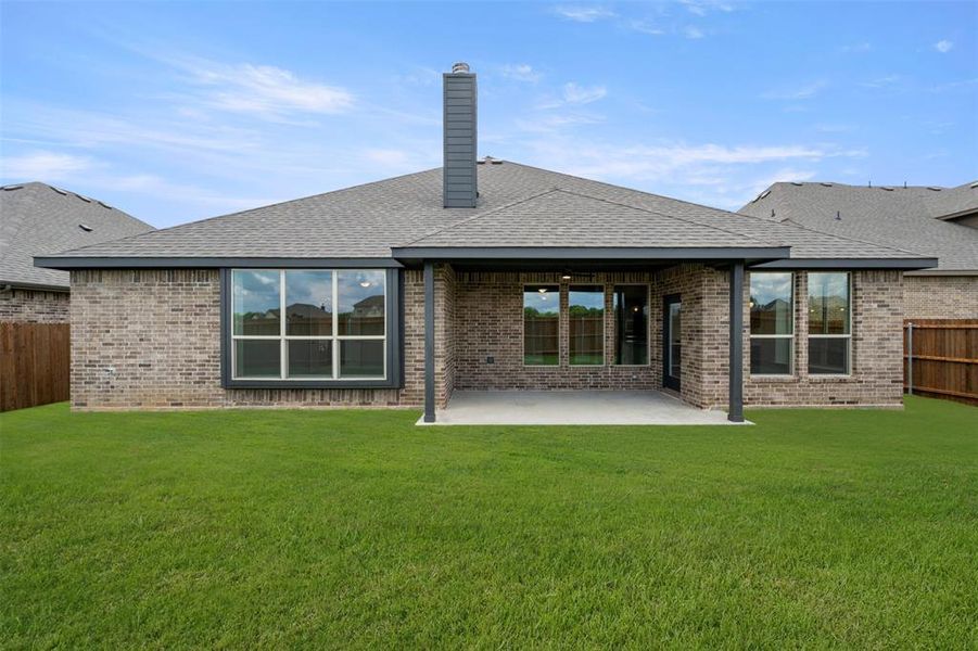 Front exterior of a new home in Mockingbird Hills, Joshua, TX, highlighting curb appeal (Image 17). Front exterior of a new home in Mockingbird Hills, Joshua, TX, highlighting curb appeal (Image 17).