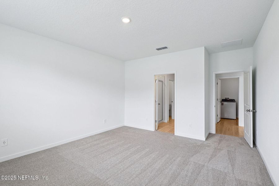 Spacious, unfurnished interior of a new home in Flagler Village - Signature Series, Palm Coast (Image 17).