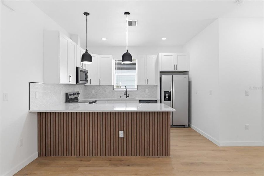 Furnished interior view inside a new home in , Dade City (Image 7).