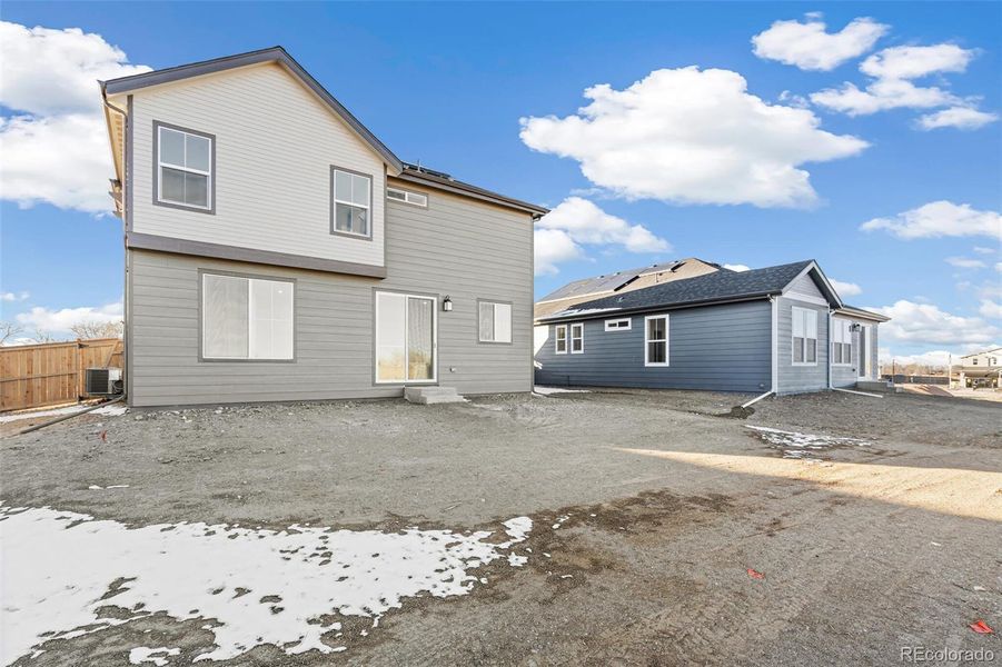 Exterior details and patio area of a home in The Nest Classic at Canyon Creek, Erie (Image 21).