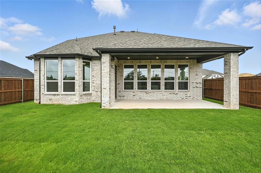 Front exterior of a new home in Wellington: Artisan Series - 50ft lots, Haslet, TX, highlighting curb appeal (Image 22). Front exterior of a new home in Wellington: Artisan Series - 50ft lots, Haslet, TX, highlighting curb appeal (Image 22).