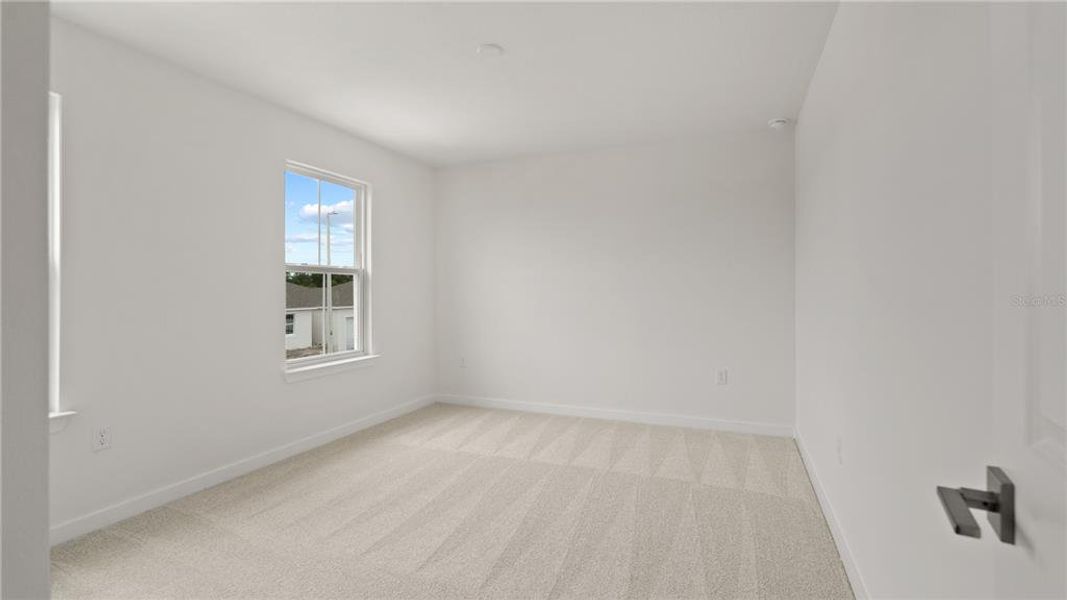 Spacious, unfurnished interior of a new home in Willowbrook North, Winter Haven (Image 31).