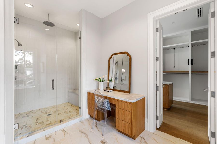 Lovely vanity area and oversized shower.