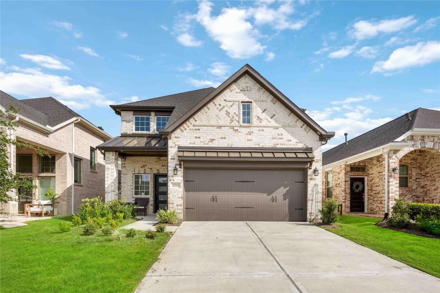 Front exterior of a new home in , Conroe, TX, highlighting curb appeal (Image 20). Front exterior of a new home in , Conroe, TX, highlighting curb appeal (Image 20).