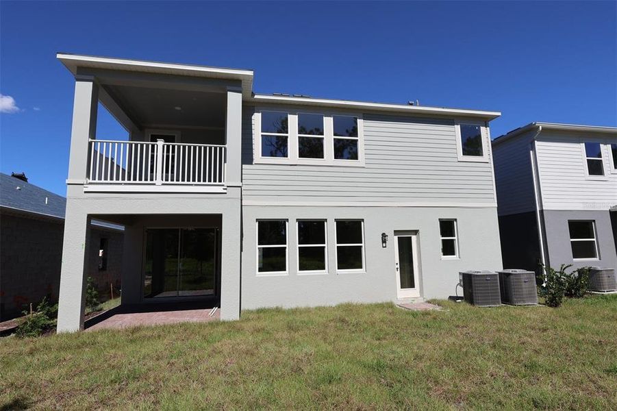 Exterior details and patio area of a home in Eden at Crossprairie, St. Cloud (Image 3). Exterior details and patio area of a home in Eden at Crossprairie, St. Cloud (Image 3).