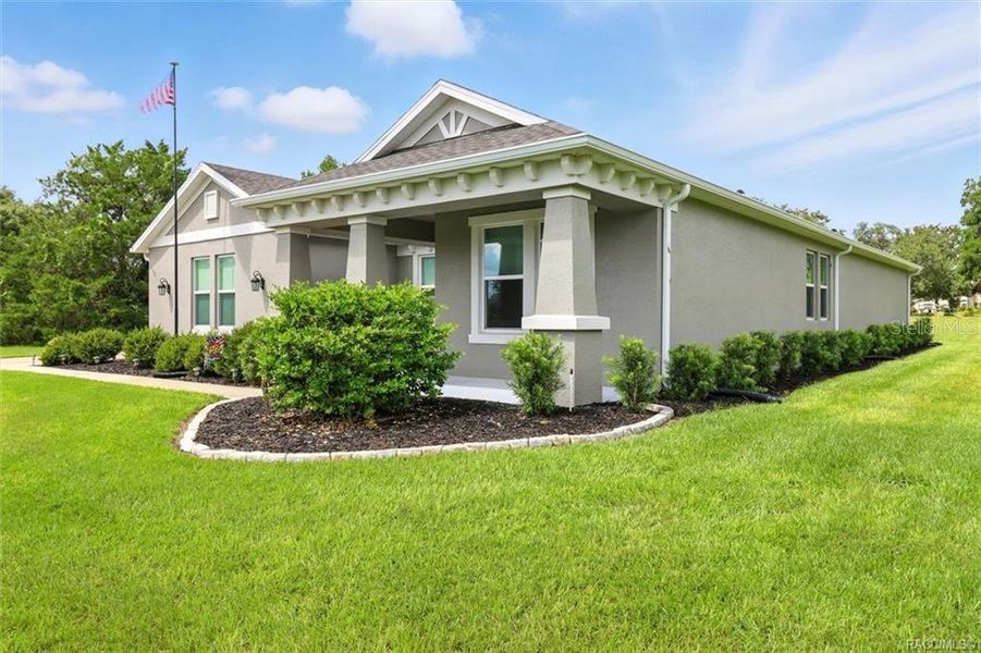 Front exterior of a new home in Clearview Estates, Hernando, FL, highlighting curb appeal (Image 22).