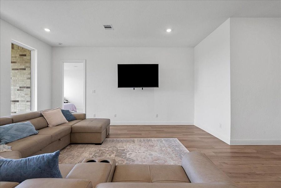 Spacious living room open to the kitchen for easy everyday living and gatherings. Spacious living room open to the kitchen for easy everyday living and gatherings.