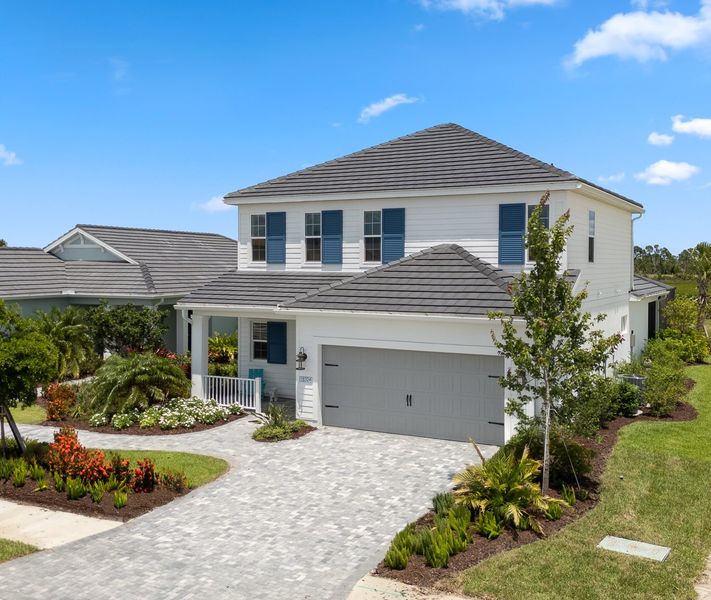 Representative exterior photo of a completed home built from the Heritage 2 by Neal Communities in Palmera, Venice, FL (Image 2).