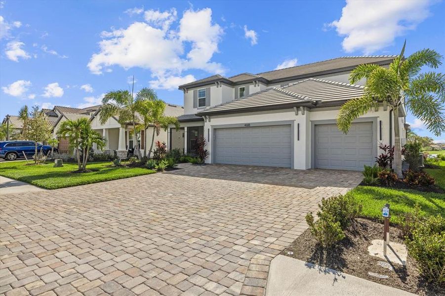 Front exterior of a new home in , Lakewood Ranch, FL, highlighting curb appeal (Image 2).