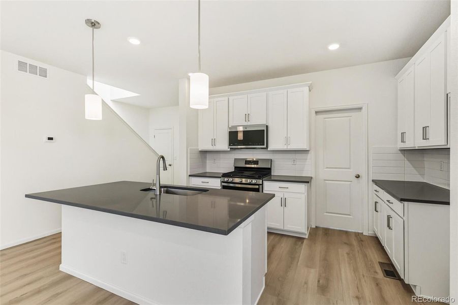 Furnished interior view inside a new home in , Aurora (Image 6).