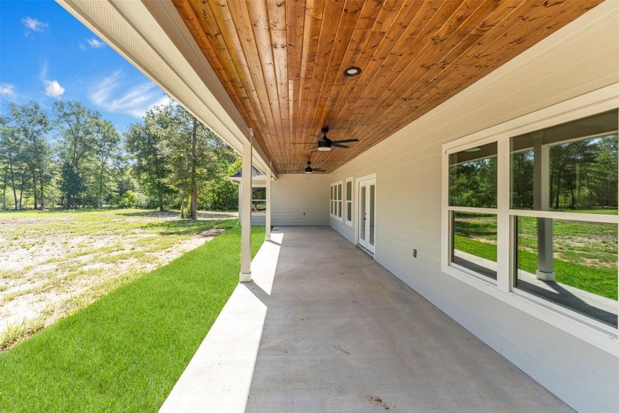 Exterior details and patio area of a home in , New Waverly (Image 4).