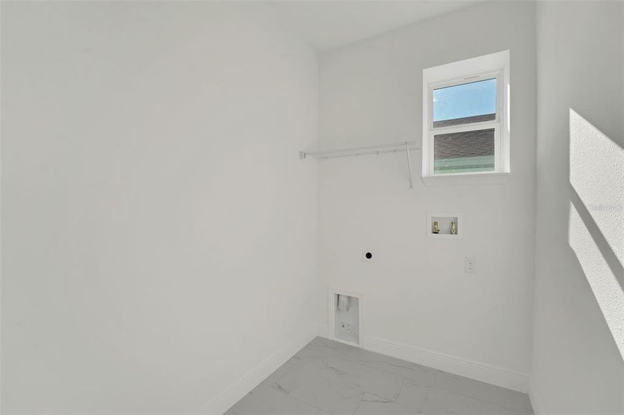 Spacious, unfurnished interior of a new home in Green Key Village, Lady Lake (Image 24).