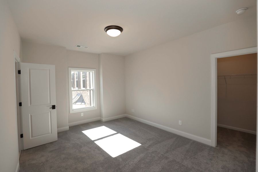 Representative unfurnished interior of a home built from the The Maddox by The Providence Group in Bellmoore Park, Johns Creek (Image 37).