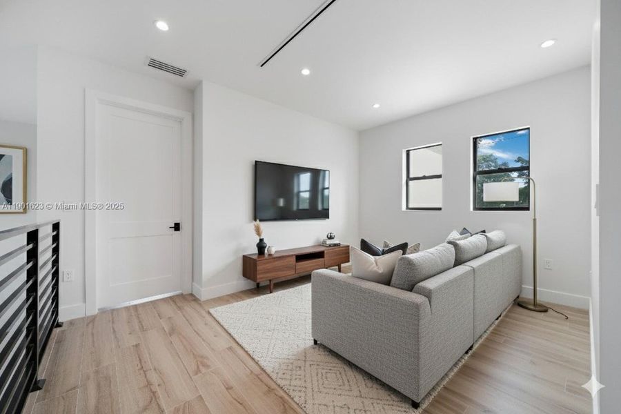 Second floor Den/family room. Virtually staged