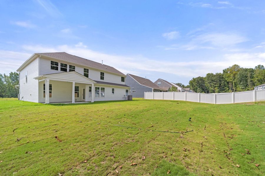 Exterior details and patio area of a home in Fiddler's Ridge, Advance (Image 3).