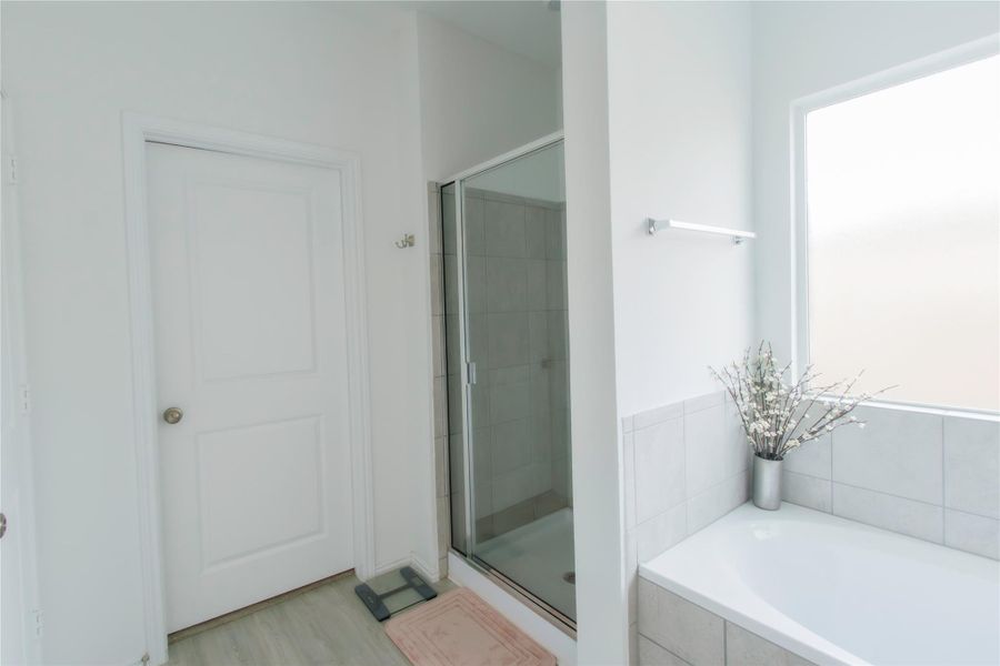 Bathroom with a separate tub and shower.