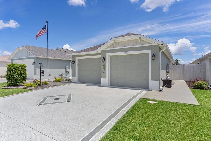 Front exterior of a new home in , The Villages, FL, highlighting curb appeal (Image 22).
