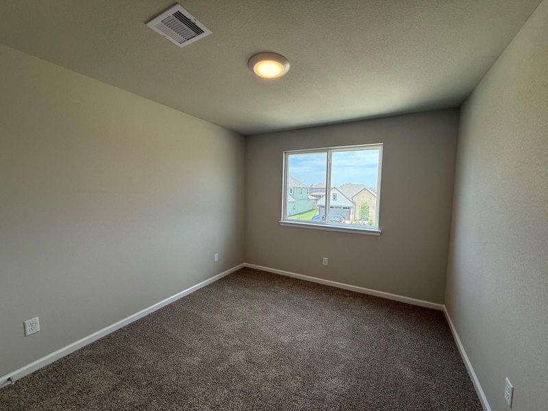 Spacious, unfurnished interior of a new home in Midtown Reserve, College Station (Image 12).