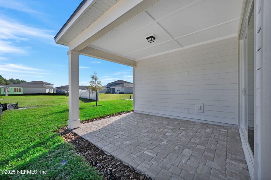 Exterior details and patio area of a home in The Preserve at Bannon Lakes, St. Augustine (Image 2). Exterior details and patio area of a home in The Preserve at Bannon Lakes, St. Augustine (Image 2).