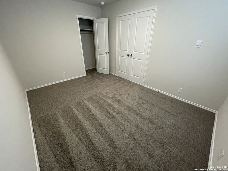 Spacious, unfurnished interior of a new home in Whisper Falls, San Antonio (Image 6).
