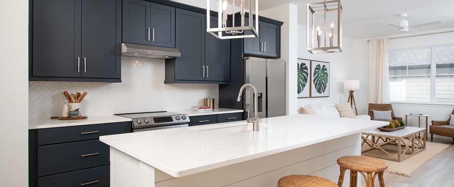 Representative furnished interior of a home built from the Regina II by Ashton Woods in Northlake Townhomes, Winter Garden (Image 5).