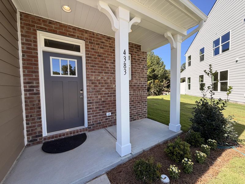 Exterior details and patio area of a home in Harrisburg Village Townhomes, Harrisburg (Image 2). Exterior details and patio area of a home in Harrisburg Village Townhomes, Harrisburg (Image 2).
