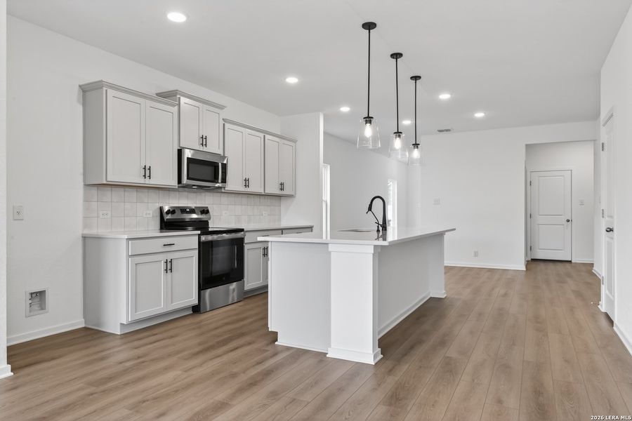 Furnished interior view inside a new home in Hennersby Hollow, San Antonio (Image 9).