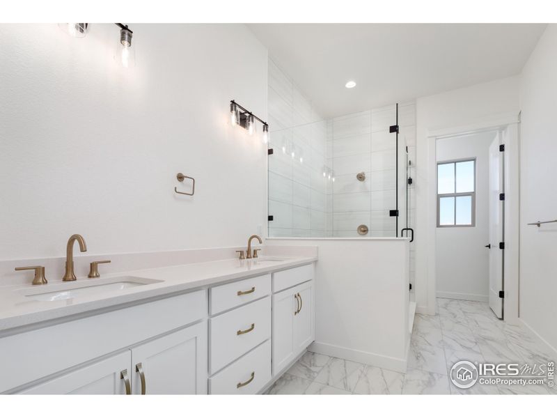 Primary Bathroom with Dual Sinks Primary Bathroom with Dual Sinks