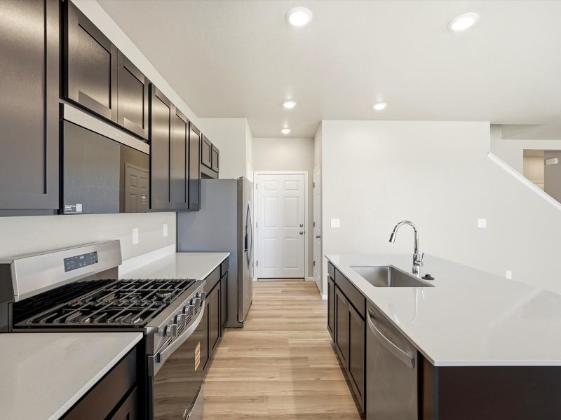 Furnished interior view inside a new home in Buffalo Highlands: The Flora Collection, Commerce City (Image 3).
