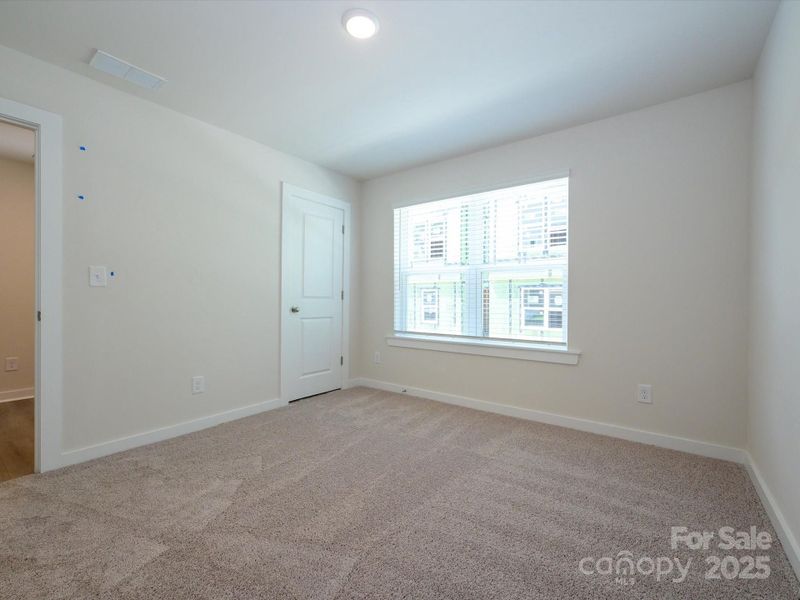 Spacious, unfurnished interior of a new home in Central Living at Craig, Charlotte (Image 13).