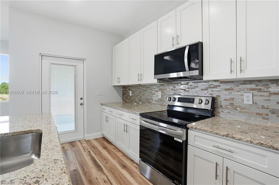 Furnished interior view inside a new home in , Labelle (Image 6).