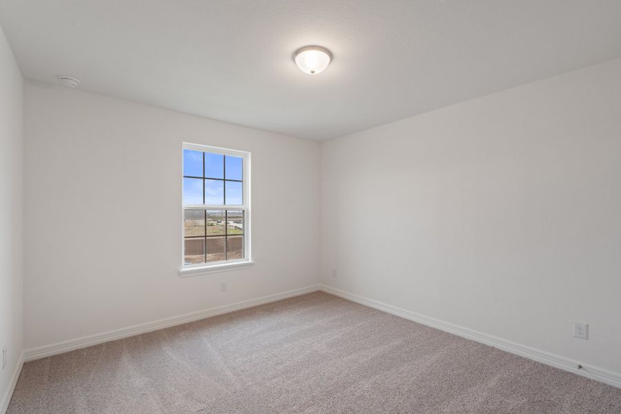 Second bedroom. Note: Sample product photo - actual exterior and interior selections may vary by homesite