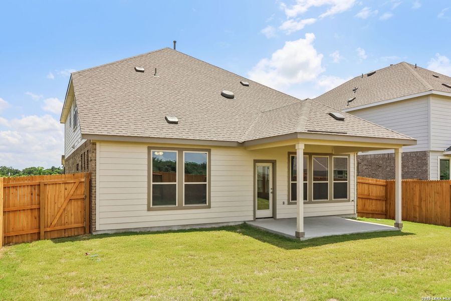 Exterior details and patio area of a home in Stream Waters, Seguin (Image 17).