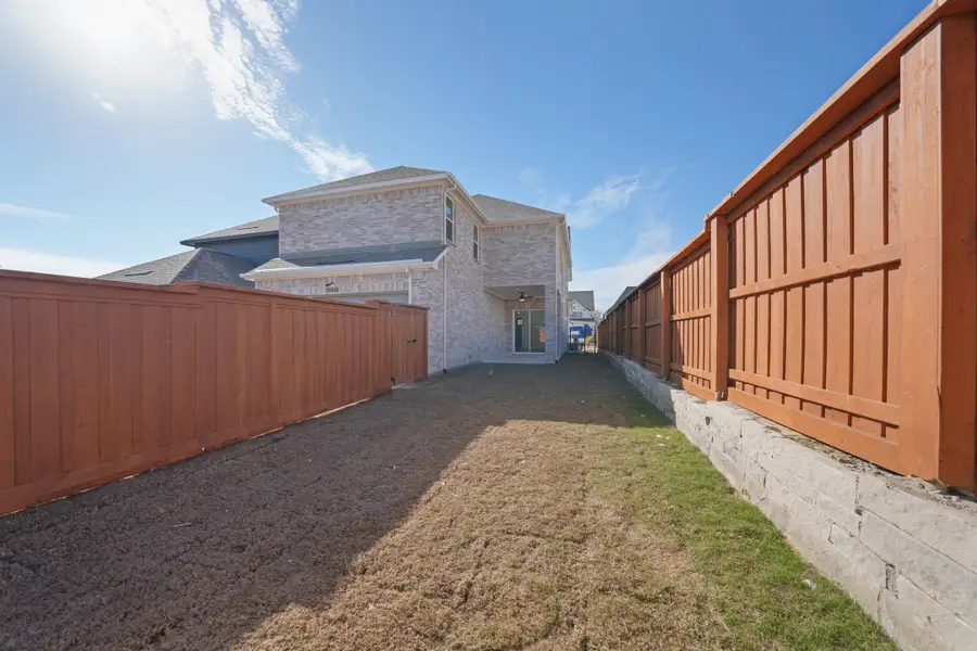 Exterior details and patio area of a home in Fields - 40' Lots, Frisco (Image 4). Exterior details and patio area of a home in Fields - 40' Lots, Frisco (Image 4).