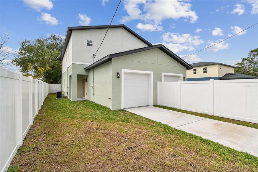 Front exterior of a new home in , St. Petersburg, FL, highlighting curb appeal (Image 23). Front exterior of a new home in , St. Petersburg, FL, highlighting curb appeal (Image 23).